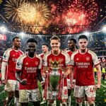 Arsenal players celebrate with Premier League trophy amid fireworks