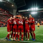 Liverpool players celebrate after winning 3-1 against Wolverhampton Wanderers